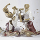 Illustration for article titled Incredible photographs capture the body-shattering war of the porcelain people